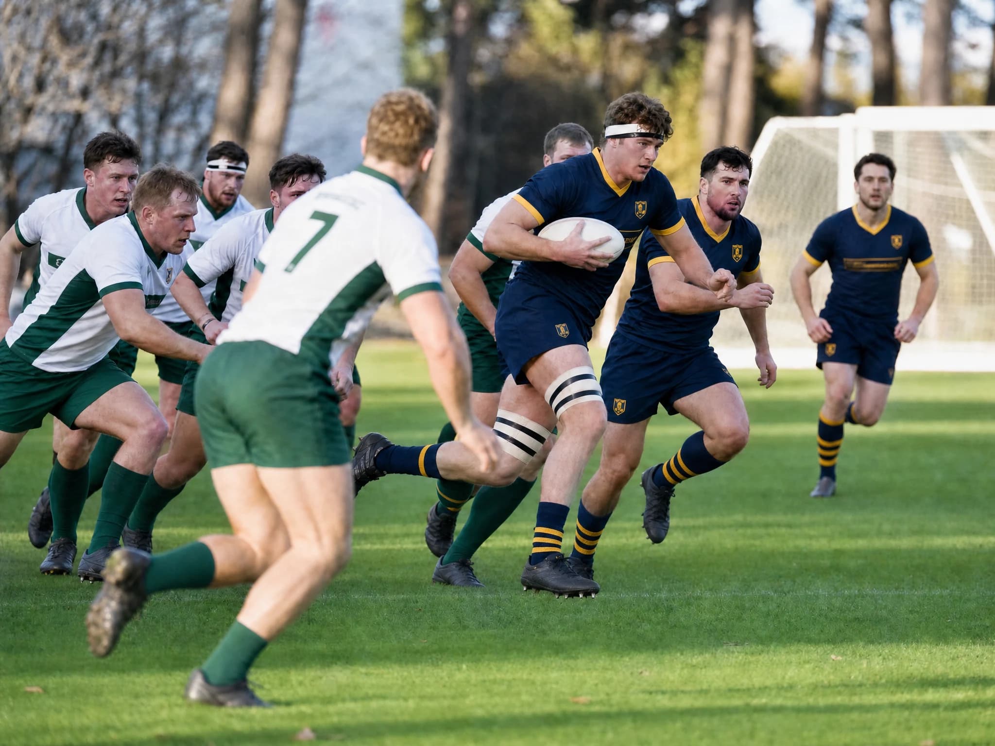 A player in navy and gold with a headband carrying the ball into a white-and-green defence