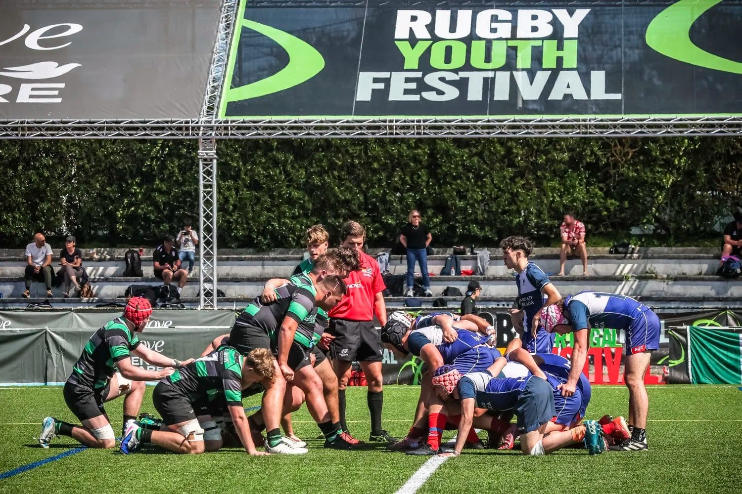 Scrum on the festival pitches at the Estádio Universitário